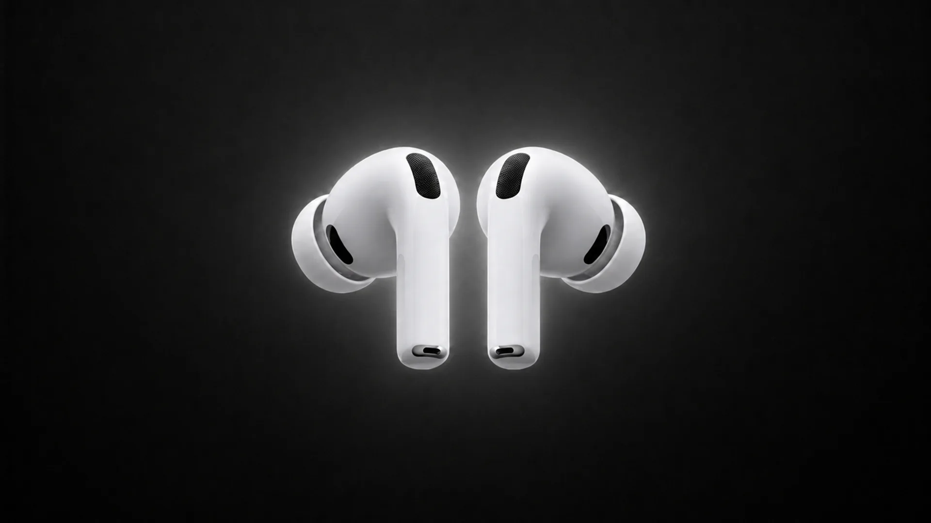 Two white wireless earbuds float facing each other against a black background, lit from behind so their edges glow, with black mesh vents and silicone ear tips visible.