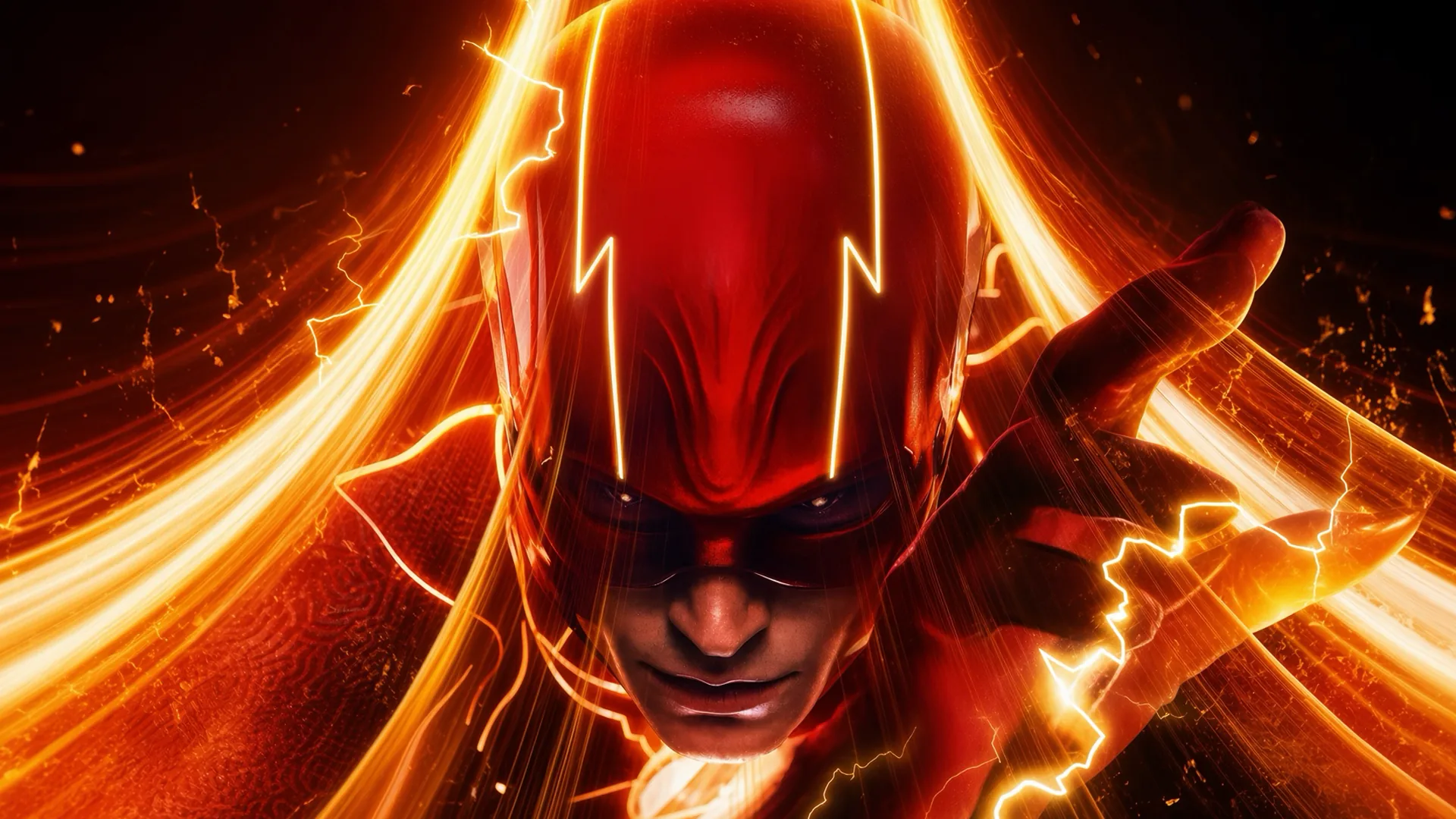 Close up of a figure in a red helmet and mask marked with lightning bolt shapes, one hand thrust toward the camera as streaks of orange and yellow lightning arc past against a dark background.