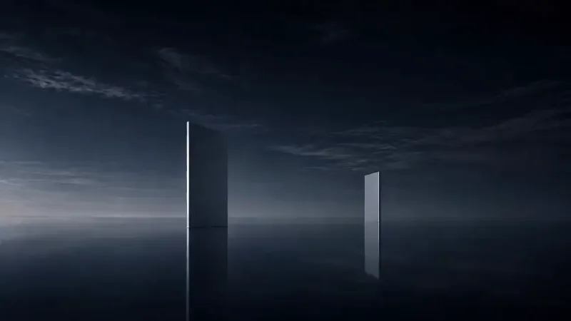Two pale upright slabs, one tall and one small, standing apart on a dark mirrored plane beneath a dim blue clouded sky.