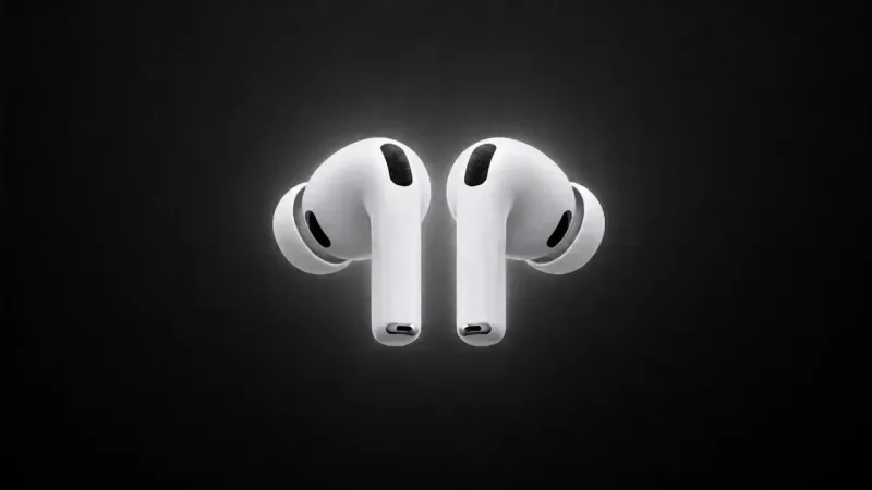 Two white wireless earbuds float facing each other against a black background, lit from behind so their edges glow, with black mesh vents and silicone ear tips visible.